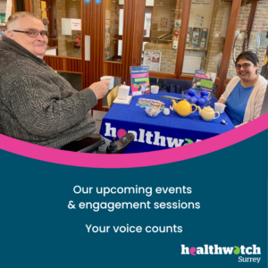 2 of our volunteers at an event. Both are sitting at a table which is branded with a Healthwatch Surrey tablecloth and displays various leaflets and merchandise.